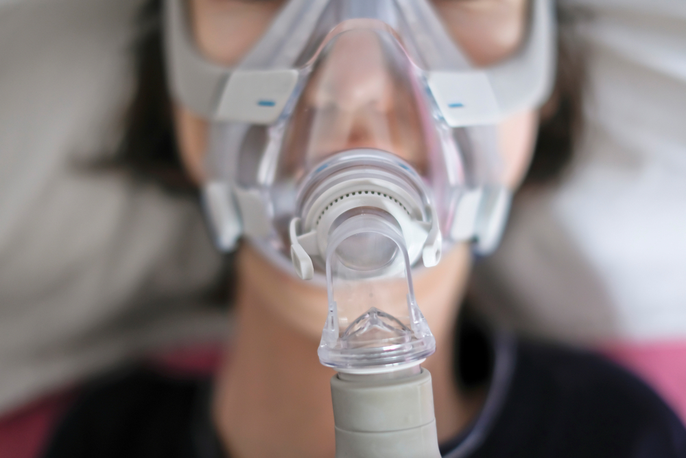 woman wearing bipap machine mask